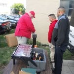 Members of the C.P.D. Ordnance Unit check the weapons in before they are cataloged.