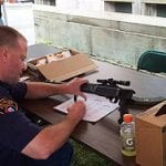 Policeman at handgun buyback