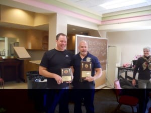 Commander Stacho and Captain Sulzer with plaques at Chili Cook Off