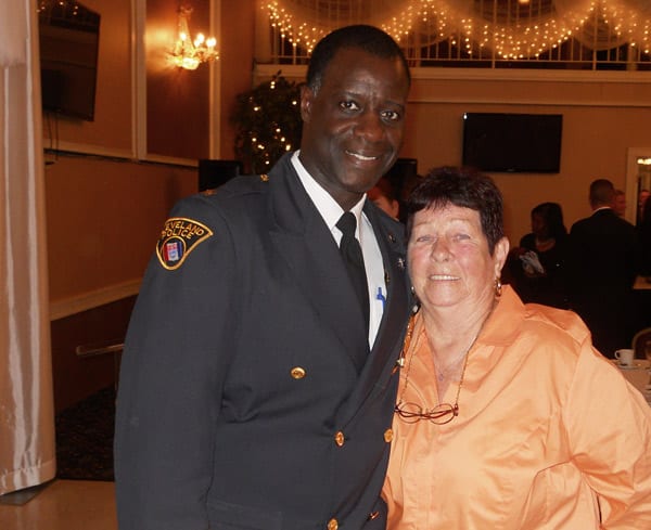 Cleveland Police Chief Calvin Williams thanks Betty Rodes for her support and for attending the award presentations.