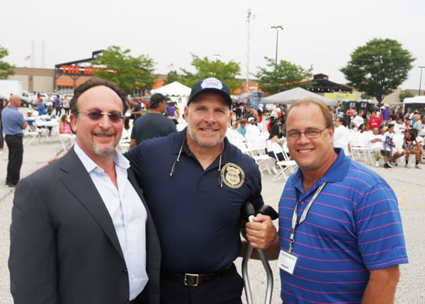 Captain Keith Sulzer in the middle, is flanked (right) by First Interstate Property's Mitchell Schneider, and (left) by Scott Ochocki of U-Haul Inc.