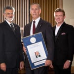 Michael McGrath accepting the Founders Award, also pictured are Mayor Frank G. Jackson and Martin Savidge.