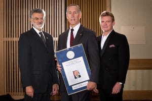 Michael McGrath accepting the Founders Award, also pictured are Mayor Frank G. Jackson and Martin Savidge.