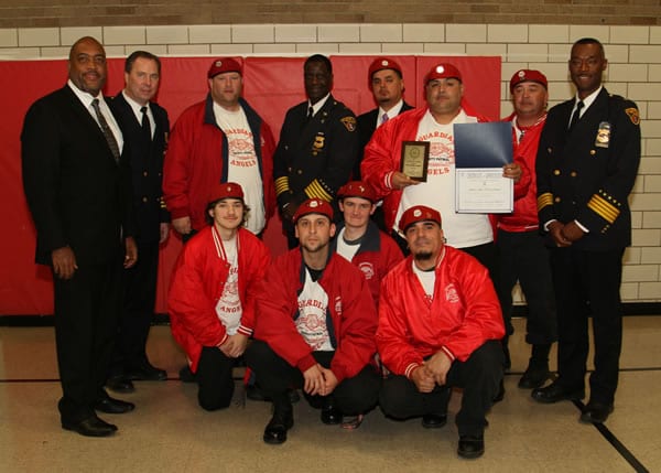 The Cleveland Police Foundation Community Service Award winners Guardian Angels are flanked by from left to right, Community Relation's Executive Director Blaine Griffith, Second District Commander Thomas Stacho, Chief Calvin Williams, and Deputy Chief Dornat Drummond.