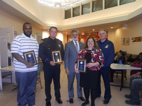 The Cleveland Police Foundation's Community Service Awards recipients proudly display their awards. From L to R: Mr.  Dwayne Malone, PO Rick Connolly, Mayor Frank Jackson, Ms. Judy Varne of the Goodrich-Gannet Center, and the CPF's Bob Guttu.