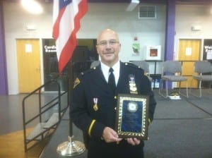 Lieutenant Michael Butler with his Cleveland Police Foundation Community Service Award.