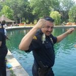 Sgt. Tim Higgins proudly showing the largest fish he caught all day.