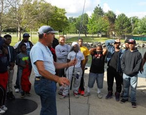 The children get a quick lesson on fishing from Captain Vytus prior to going out on the Linda Mae at Wildwood Park.