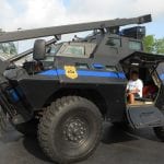 The children got to sit in the S.W.A.T. truck and visit with the officers.