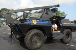 The children got to sit in the S.W.A.T. truck and visit with the officers.