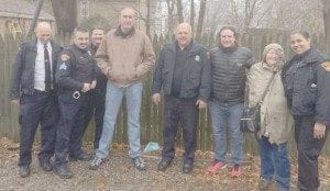 Members of Progressive Insurance’s Creative Business Operations Group partnered with the Cleveland Division of Police Bureau of Community Policing to make for a special Christmas for a family in need. (L to R): Steve Warshaw, Tim Higgins, Rich Ubienski, Brian Dubasik, Ed Schulte, Mark Dreimiller, Brenda Henley and Anna Mercado.