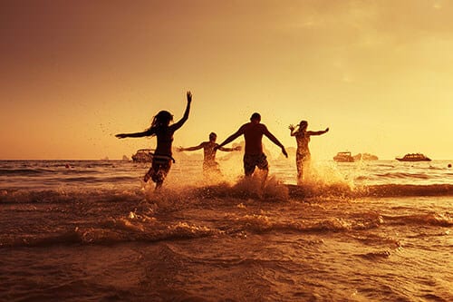 Friends having fun on the beach