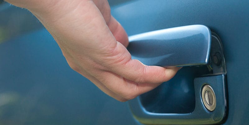 male hand opening car door
