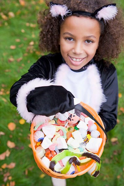 Little girl trick-or-treating