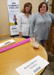 Kathy Mannion and Jean Marincic selling Chinese raffle tickets at Night at the Races.