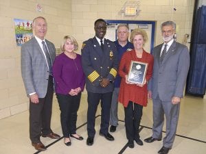 (left to right) Mike McGrath, Kim Snyder, Chief Calvin Williams, Bob Guttu, Rose Roy, Mayor Frank Jackson.