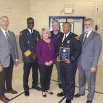 (left to right) Mike McGrath, Chief Calvin Williams, Kim Snyder, Bob Guttu, Officer Hubert Kidd, Mayor Frank Jackson.