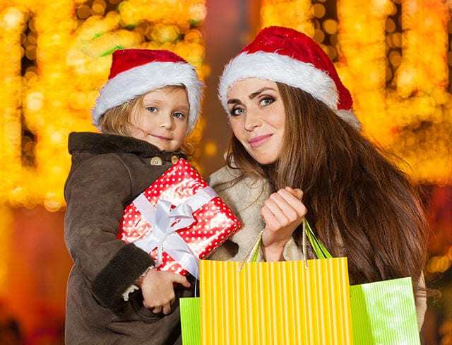 Mother shopping with child