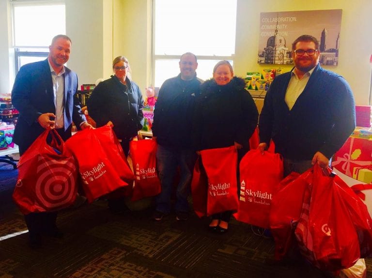 Nearly 100 generous elves came out on a blustery winter day to support the Skylight Foundation Holiday Toy Drive Networking Event on December 13