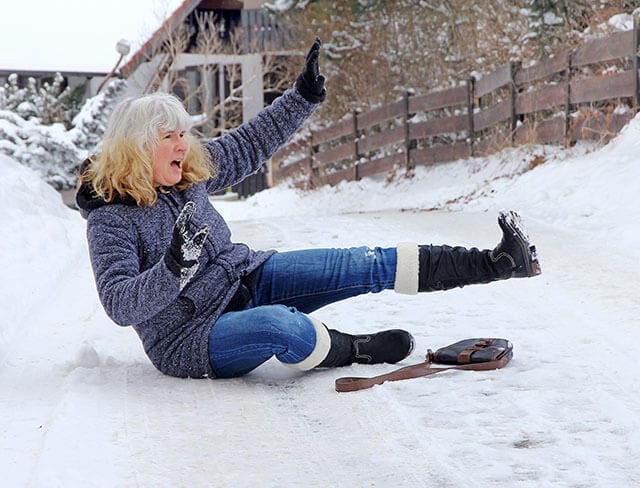 Woman falling on ice