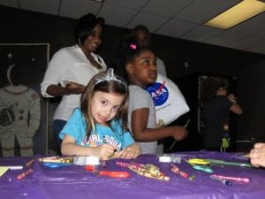 The Cleveland Police Foundation and Cops for Kids spent Saturday at Burke Lakefront Airport at the International Women's Air and Space Museum's Free Family Day. Cleveland Police officers from Community Policing and the 3rd District passed out gift bags with stuffed animals and police coloring books, crayons, and badges.