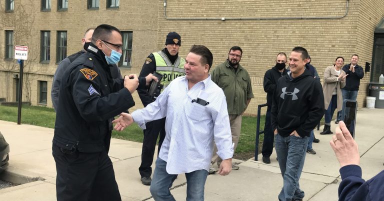Retiring Officer Chuck Judd being playfully greeted during his walk-out ceremony