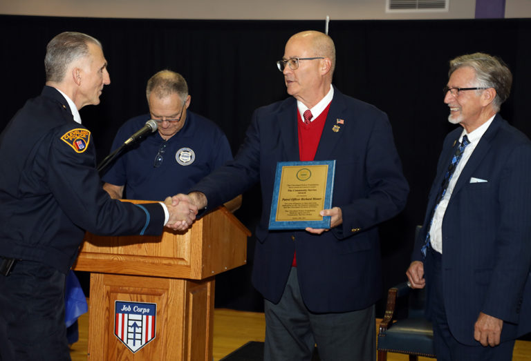 Rick Dechant Presents Officer Rick Mauer with his award