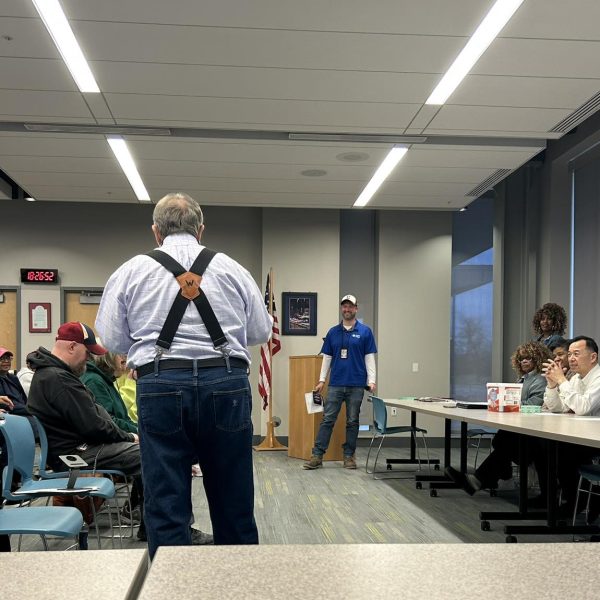 Community member speaks during the District 3 Policing Committee meeting as city staff listen.