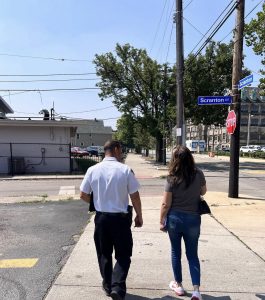 Commander Maffo-Judd and Councilwoman Santana walk side by side on Scranton Road during the safety walk.