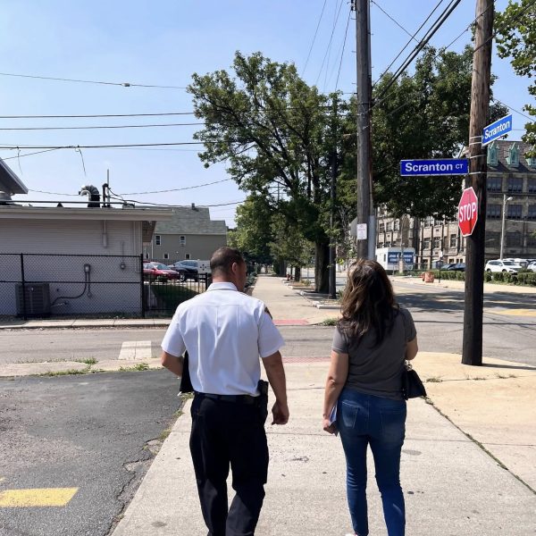 Commander Maffo-Judd and Councilwoman Santana walk side by side on Scranton Road during the safety walk.