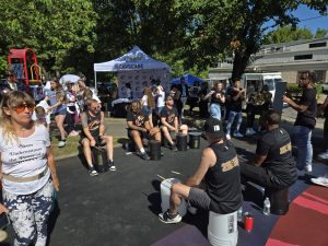 Members of the Cavaliers 216Stix drumline perform for a crowd during the Trent Park celebration.