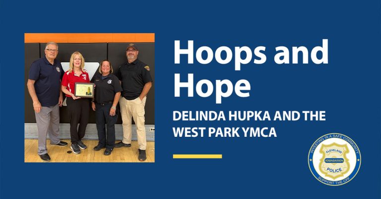 Graphic recognizing Delinda Hupka and the West Park YMCA as the Cleveland Police Foundation’s Community Partner of the Month for July 2025. The text reads: ‘Hoops and Hope – Delinda Hupka and the West Park YMCA,’ alongside a photo of Hupka holding a plaque with Cleveland Police representatives.