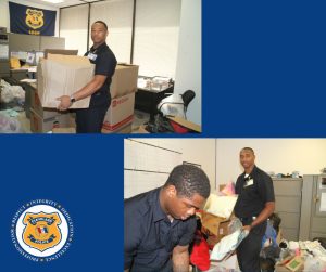Police recruits sort through donations indoors, lifting boxes and bags of clothing and supplies collected for Rainbow Terrace families.