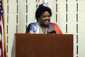 Stephanie Howse-Jones addressing the audience from the podium.