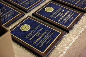 Close-up of Cleveland Police Foundation Community Service Award plaques.