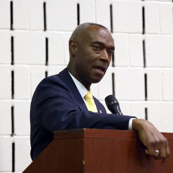 Public Safety Director Wayne Drummond speaking at the podium during the awards ceremony.