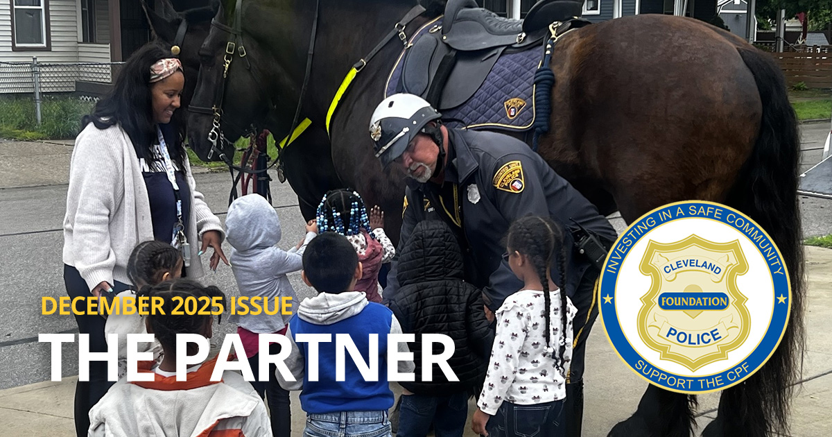 The Partner December 2025 newsletter header featuring Cleveland Police officers connecting with local children through community outreach.