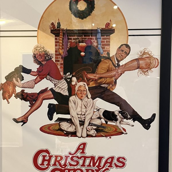 Framed movie poster for A Christmas Story showing the main characters posed in front of a fireplace.