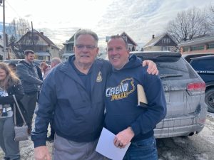 Bob Guttu and Officer Paul Beckwith pose together outside the Second District following the retirement ceremony